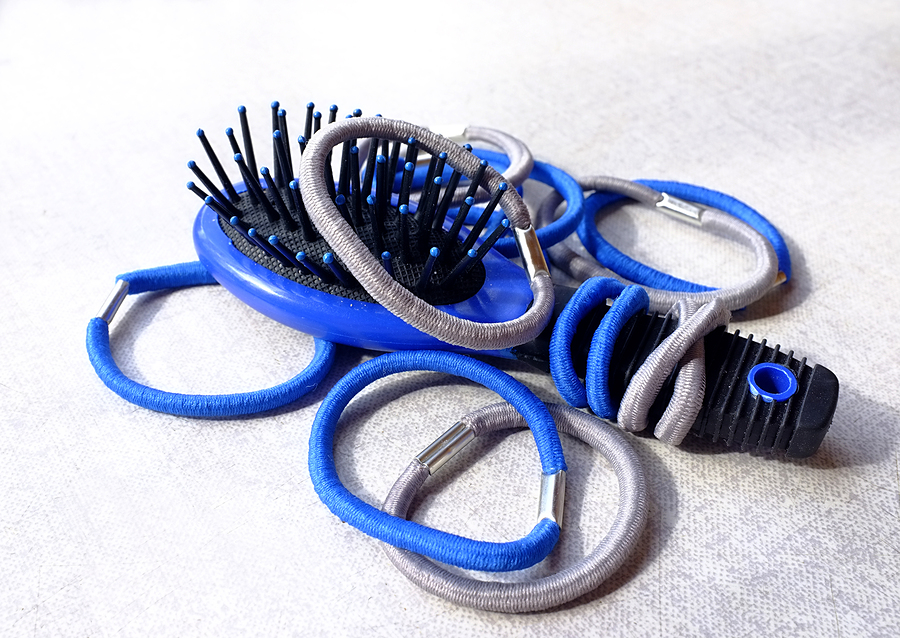 Elastic hair bands and a hair brush